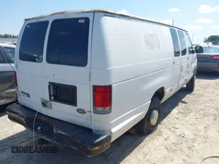 1998 Ford Econoline Cargo with VIN 1FTNS2421WHC08759, listed as a IAAI auction lot 42785005 with Not provided miles and . Bid and sale history available at DreamBid. Image 4.