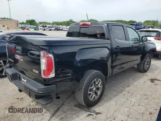 2016 GMC Canyon 4WD SLE with VIN 1GTG6CE31G1317825, listed as a Copart auction lot 53458404 with 102,918 mi miles and Salvage Title. Bid and sale history available at carsss.com. Image 3.
