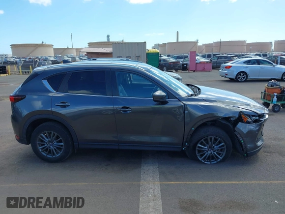 2021 Mazda CX-5 Touring with VIN JM3KFACM2M1348305, listed as a IAAI auction lot 41627199 with 30,044 mi miles. Bid and sale history available at carsss.com. Image 14.