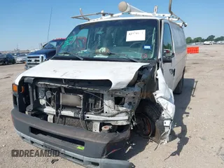 2014 Ford Econoline Cargo Commercial with VIN 1FTNE1EW4EDB20183, listed as a IAAI auction lot 42231075 with 260,818 mi miles and . Bid and sale history available at DreamBid. Image 2.