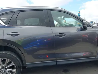 2021 Mazda CX-5 Grand Touring with VIN JM3KFADM2M1340669, listed as a IAAI auction lot 41916687 with 83,872 mi miles. Bid and sale history available at carsss.com. Image 14.