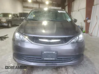 2020 Chrysler Voyager LXi z VIN 2C4RC1DG9LR256949, wystawiony jako Copart lot #55558855 z przebiegiem 182 840 mil mil oraz Tytuł czysty. Historia ofert i sprzedaży dostępna na DreamBid. Obrazek 5.