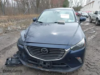 2017 Mazda CX-3 Grand Touring with VIN JM1DKFD75H0179167, listed as a IAAI auction lot 41980243 with 69,076 mi miles. Bid and sale history available at carsss.com. Image 6.
