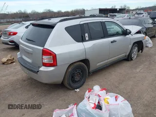 2007 Jeep Compass Sport with VIN 1J8FT47W57D397445, listed as a IAAI auction lot 41699966 with 235,960 mi miles. Bid and sale history available at carsss.com. Image 4.