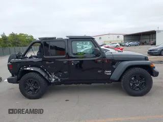 2018 Jeep Wrangler Unlimited Sport S with VIN 1C4HJXDG8JW105612, listed as a IAAI auction lot 42420765 with 54,873 mi miles and . Bid and sale history available at DreamBid. Image 12.
