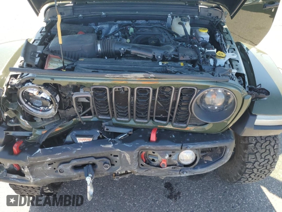 2024 Jeep Wrangler Rubicon z VIN 1C4PJXFG8RW226581, wystawiony jako Copart lot #55681685 z przebiegiem 17 738 mil mil oraz Szkoda całkowita • Salvage title. Historia ofert i sprzedaży dostępna na DreamBid. Obrazek 12.