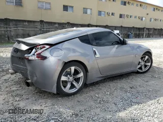 2009 Nissan 370Z z VIN JN1AZ44E69M405389, wystawiony jako Copart lot #43340975 z przebiegiem 31 521 mil mil oraz Szkoda całkowita • Salvage title. Historia ofert i sprzedaży dostępna na DreamBid. Obrazek 3.