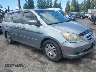 2006 Honda Odyssey EX-L z VIN 5FNRL38776B108949, wystawiony jako IAAI lot #42349613 z przebiegiem 206 240 mil mil oraz . Historia ofert i sprzedaży dostępna na DreamBid. Obrazek 1.