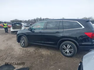 2017 Honda Pilot EX with VIN 5FNYF6H35HB089810, listed as a IAAI auction lot 41612186 with 116,489 mi miles and . Bid and sale history available at DreamBid. Image 14.