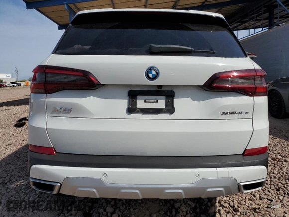 2023 BMW X5 xDrive45e z VIN 5UXTA6C02P9N98430, wystawiony jako Copart lot #51509085 z przebiegiem 24 093 mil mil oraz Szkoda całkowita • Salvage title. Historia ofert i sprzedaży dostępna na DreamBid. Obrazek 6.