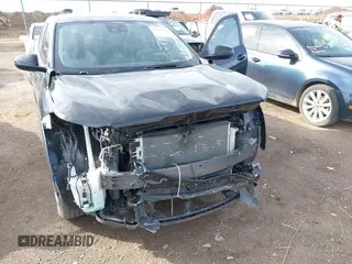 2025 Chevrolet Trax LS with VIN KL77LFEP7SC085237, listed as a IAAI auction lot 41687172 with 11,070 mi miles and . Bid and sale history available at DreamBid. Image 6.