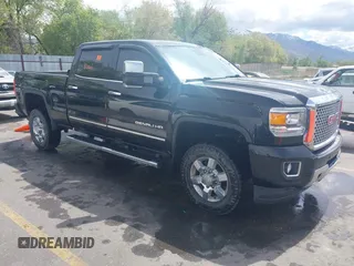 2015 GMC Sierra 2500HD Denali with VIN 1GT120EG4FF591539, listed as a IAAI auction lot 42119894 with Not provided miles and . Bid and sale history available at DreamBid. Image 1.