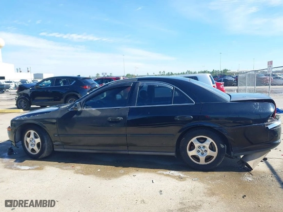 2000 Lincoln LS with VIN 1LNHM86S4YY818127, listed as a IAAI auction lot 41329978 with 158,134 mi miles. Bid and sale history available at carsss.com. Image 15.