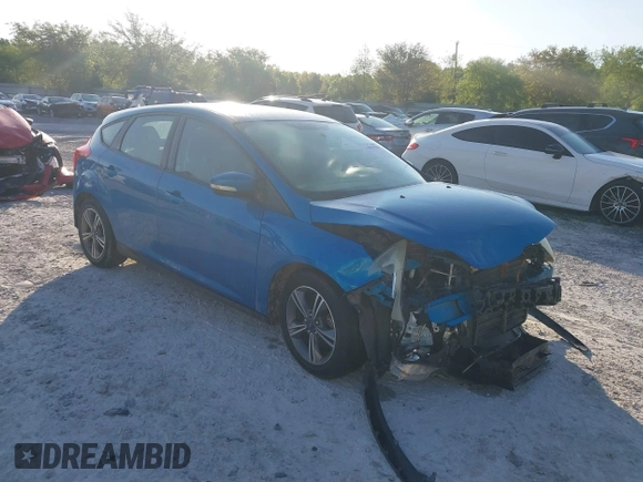 2014 Ford Focus SE with VIN 1FADP3K21EL403591, listed as a IAAI auction lot 42031946 with 132,630 mi miles. Bid and sale history available at carsss.com. Image 1.