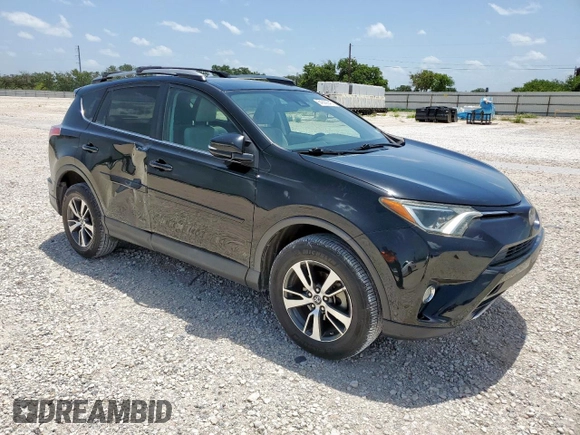2018 Toyota RAV4 XLE with VIN 2T3WFREV7JW429716, listed as a Copart auction lot 64309045 with 156,445 mi miles and Salvage title. Bid and sale history available at DreamBid. Image 4.