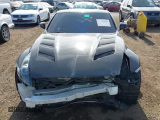 2009 Nissan 370Z Touring with VIN JN1AZ44E39M408668, listed as a IAAI auction lot 41231840 with 93,826 mi miles and . Bid and sale history available at DreamBid. Image 13.