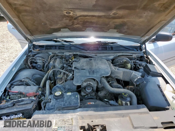 2004 Ford Crown Victoria LX z VIN 2FAFP74W54X184815, wystawiony jako Copart lot #57280725 z przebiegiem 294 513 mil mil oraz Szkoda całkowita • Salvage title. Historia ofert i sprzedaży dostępna na DreamBid. Obrazek 11.
