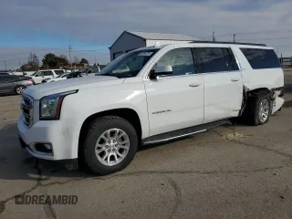 2019 GMC Yukon XL SLT with VIN 1GKS2GKCXKR272254, listed as a Copart auction lot 87596775 with 102,089 mi miles and Salvage Title. Bid and sale history available at carsss.com. Image 1.