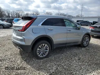 2024 Cadillac XT4 AWD Premium Luxury with VIN 1GYFZDR40RF123637, listed as a Copart auction lot 46852195 with 5,001 mi miles and Salvage title. Bid and sale history available at DreamBid. Image 3.