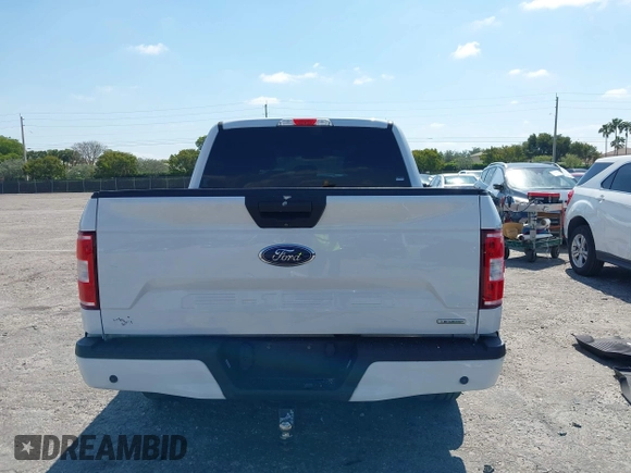 2018 Ford F-150 XL with VIN 1FTEW1CP8JKE91006, listed as a IAAI auction lot 42123840 with 76,806 mi miles and . Bid and sale history available at DreamBid. Image 17.