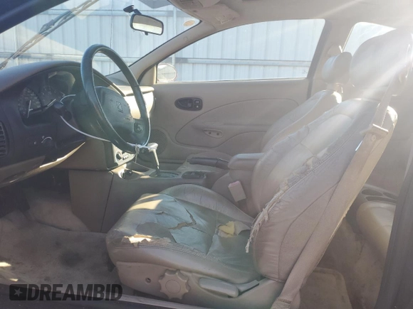 2001 Saturn SC z VIN 1G8ZY12751Z284992, wystawiony jako Copart lot #87116694 z przebiegiem 134 690 mil mil oraz Tytuł czysty. Historia ofert i sprzedaży dostępna na DreamBid. Obrazek 7.