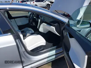 2016 Tesla Model S 90D with VIN 5YJSA1E22GF174637, listed as a IAAI auction lot 42234083 with 142,915 mi miles and . Bid and sale history available at DreamBid. Image 5.