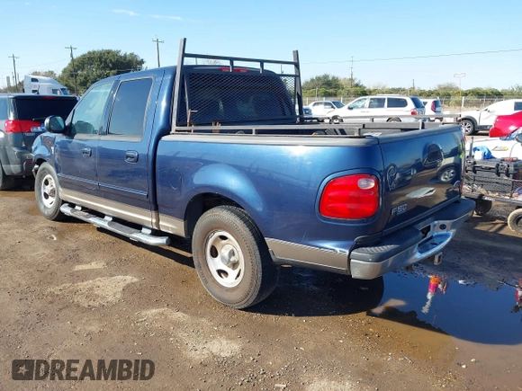 2002 Ford F-150 XLT with VIN 1FTRW07692KC25069, listed as a IAAI auction lot 41387047 with 208,811 mi miles. Bid and sale history available at carsss.com. Image 3.
