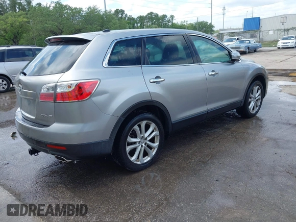 2011 Mazda CX-9 Grand Touring with VIN JM3TB2DA8B0307271, listed as a IAAI auction lot 41896962 with 144,624 mi miles and . Bid and sale history available at DreamBid. Image 4.