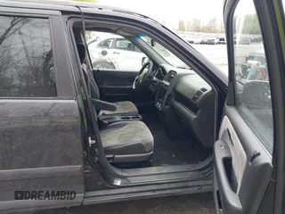 2003 Honda CR-V EX with VIN SHSRD78823U161401, listed as a IAAI auction lot 42211722 with 230,486 mi miles and . Bid and sale history available at carsss.com. Image 5.