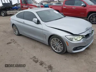 2014 BMW 4 Series 428i xDrive z VIN WBA3N5C53EF716542, wystawiony jako IAAI lot #41157641 z przebiegiem 135 264 mil mil oraz . Historia ofert i sprzedaży dostępna na DreamBid. Obrazek 1.