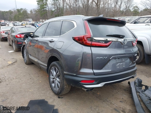 2021 Honda CR-V Touring with VIN 2HKRW2H93MH675015, listed as a IAAI auction lot 41711953 with 58,287 mi miles. Bid and sale history available at carsss.com. Image 4.