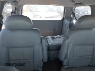 2001 Toyota Sienna LE z VIN 4T3ZF13C61U393209, wystawiony jako IAAI lot #42304583 z przebiegiem 253 662 mil mil oraz . Historia ofert i sprzedaży dostępna na DreamBid. Obrazek 8.