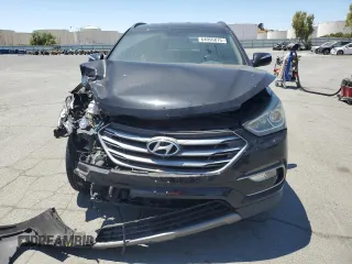 2017 Hyundai Santa Fe 2.4L with VIN 5NMZU3LBXHH019659, listed as a Copart auction lot 64056815 with 121,210 mi miles and Salvage title. Bid and sale history available at DreamBid. Image 5.