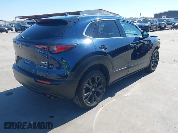 2021 Mazda CX-30 Premium with VIN 3MVDMBDYXMM307047, listed as a IAAI auction lot 41974966 with 53,409 mi miles and . Bid and sale history available at carsss.com. Image 4.