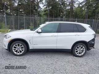 2016 BMW X5 xDrive40e z VIN 5UXKT0C55G0S77047, wystawiony jako IAAI lot #42224623 z przebiegiem 102 611 mil mil oraz . Historia ofert i sprzedaży dostępna na DreamBid. Obrazek 15.