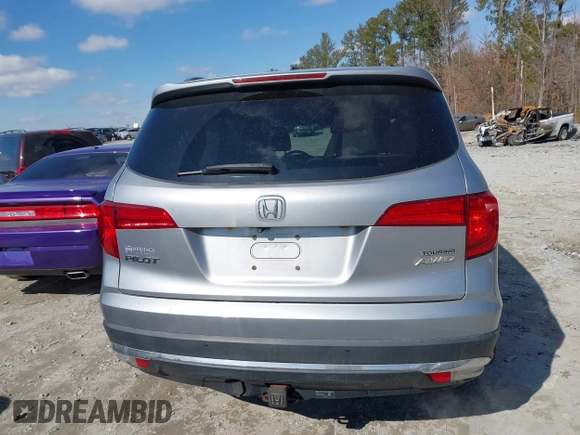 2017 Honda Pilot Touring with VIN 5FNYF6H94HB006873, listed as a IAAI auction lot 41618529 with 154,689 mi miles. Bid and sale history available at carsss.com. Image 16.