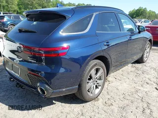 2023 Genesis GV70 Sport with VIN KMUMCDTC1PU083539, listed as a IAAI auction lot 42107968 with 21,169 mi miles and . Bid and sale history available at DreamBid. Image 4.