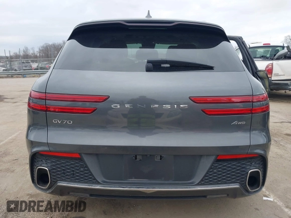 2022 Genesis GV70 2.5T with VIN KMUMADTB2NU059678, listed as a IAAI auction lot 41479833 with 30,598 mi miles and . Bid and sale history available at DreamBid. Image 16.
