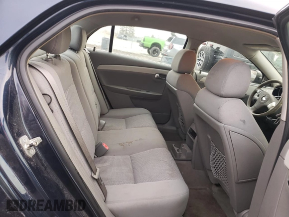2009 Chevrolet Malibu 1LS with VIN 1G1ZG57B39F238452, listed as a Copart auction lot 82978644 with 163,516 mi miles and Salvage Title. Bid and sale history available at DreamBid. Image 10.