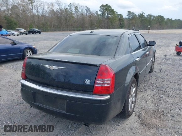 2006 Chrysler 300 C with VIN 2C3KA63H36H455735, listed as a IAAI auction lot 41875033 with 175,251 mi miles. Bid and sale history available at carsss.com. Image 4.
