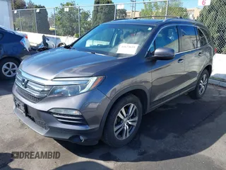 2017 Honda Pilot EX-L with VIN 5FNYF6H57HB021350, listed as a IAAI auction lot 41673635 with 101,980 mi miles and . Bid and sale history available at DreamBid. Image 17.