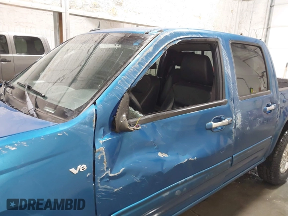 2011 GMC Canyon SLT with VIN 1GTH6NFP8B8115436, listed as a IAAI auction lot 41676023 with 148,478 mi miles. Bid and sale history available at carsss.com. Image 12.