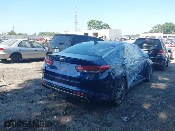 2016 Kia Optima SXL Turbo with VIN 5XXGV4L28GG087563, listed as a IAAI auction lot 39986124 with 180,160 mi miles. Bid and sale history available at carsss.com. Image 4.