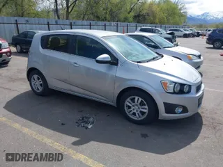 2013 Chevrolet Sonic LT with VIN 1G1JC6SG5D4210853, listed as a IAAI auction lot 42078806 with 135,837 mi miles. Bid and sale history available at carsss.com. Image 1.