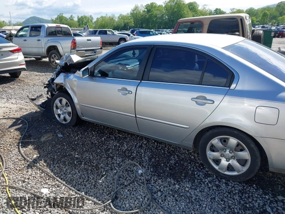 2008 Kia Optima LX z VIN KNAGE123385225909, wystawiony jako IAAI lot #42184219 z przebiegiem 118 300 mil mil oraz . Historia ofert i sprzedaży dostępna na DreamBid. Obrazek 14.