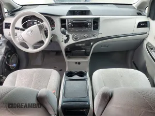 2012 Toyota Sienna LE with VIN 5TDJK3DC8CS047122, listed as a Copart auction lot 52036115 with 76,869 mi miles and Salvage Title. Bid and sale history available at carsss.com. Image 8.