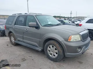 2004 Lincoln Navigator Luxury with VIN 5LMFU27RX4LJ41623, listed as a IAAI auction lot 41565114 with 214,590 mi miles. Bid and sale history available at carsss.com. Image 1.