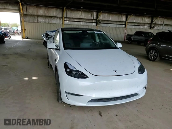 2024 Tesla Model Y Long Range with VIN 7SAYGDEE1RF165311, listed as a Copart auction lot 51711665 with 15,190 mi miles and Salvage Title. Bid and sale history available at DreamBid. Image 11.