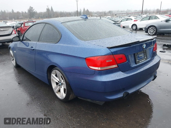 2007 BMW 3 Series 335i with VIN WBAWB73597P037969, listed as a IAAI auction lot 41602590 with 117,238 mi miles and . Bid and sale history available at DreamBid. Image 3.