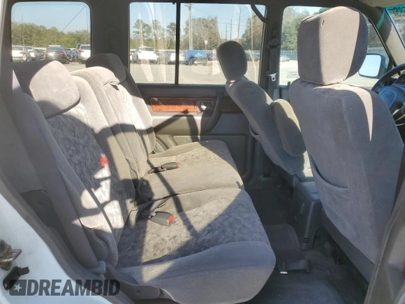 2002 Isuzu Trooper S with VIN JACDS58X427J00556, listed as a Copart auction lot 47238585 with 148,210 mi miles and Salvage Title. Bid and sale history available at DreamBid. Image 11.